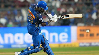 hardik pandya plays a shot during the ipl match between mi and rcb in mumbai sunday april 12 2026 ap