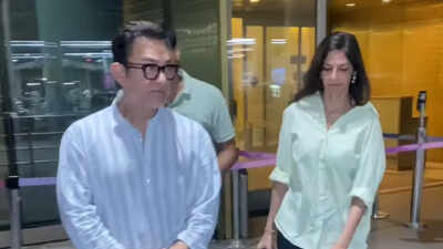 aamir khan returns to mumbai with wife gauri spratt stepson left puzzled by paparazzi rush