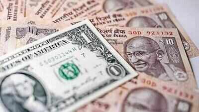 rupee tumbles 10 paise