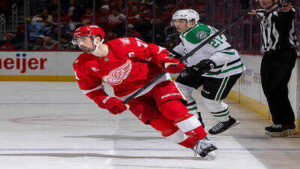 nhl dylan larkin 71 of the detroit red wings follows the play in front of jason robertson 21 of the dallas stars during the second period at little caesars arena on december 23 2025 in detroit michigan