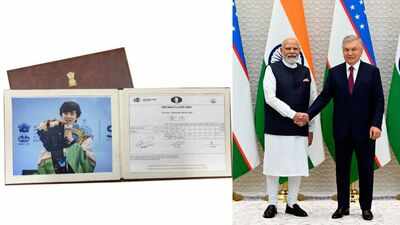 pm modi gifting javokhir sindarovs world cup scoresheet to uzbek prez