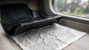 why putting newspaper under your car mats during the rainy season can help keep the carpet dry