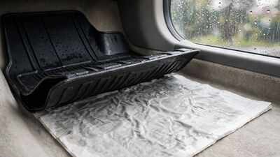 why putting newspaper under your car mats during the rainy season can help keep the carpet dry