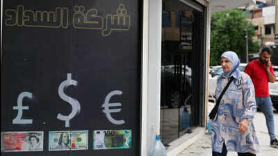 iraq devalues its currency