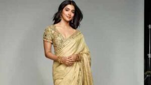 pooja hegde serves timeless ethnic elegance in a beige gold tissue silk saree worth rs 191 lakh image credits instagram